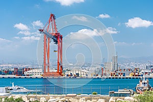 Ship to shore container crane and warehouse in Limassol cargo port, Cyprus