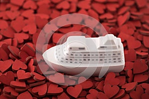 Ship toy on many red hearts