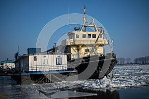 Ship trapped in ice on frozen Danube river from Romania
