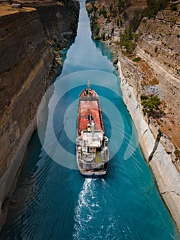 Ship traveling through the canal of corinth