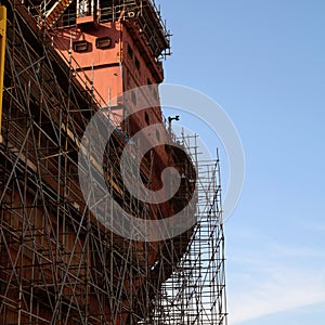 Ship under construction with scaffolding