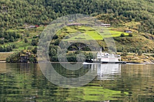 Ship on water of norwegian fjord Aurlandsfjord