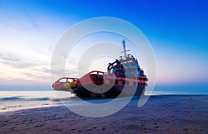 Ship Wreck along the Umm Al Quwain Coast in UAE. A stranded or abandoned vessel on the beach.