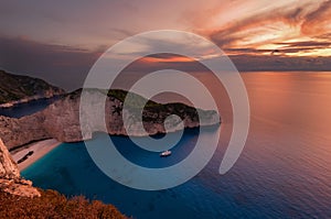 Ship Wreck beach and Navagio bay at sunset. The most famous natural landmark of Zakynthos, Greek island in the Ionian Sea.