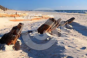 Ship wreck remnants on the shore and coast