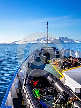 Ship& x27;s deck with zodiac boat, heading to Antarctic continent