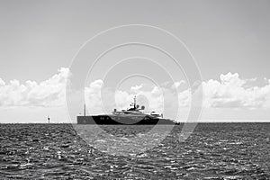 Ship or yacht in sea on blue sky in gustavia, st.barts. Luxury travel on boat and adventure. Vessel and water transport