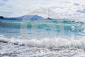 Ship yachts with white sails in the Sea.