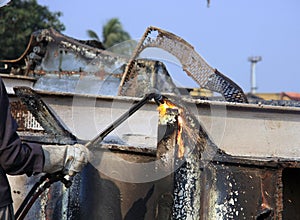 Shipbreaking Yard in Darukhana, Mumbai, India Ã¢â¬â INS Vikrant dismantling with scrap metal & workers in background photo