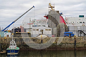 Shipbuilding and crane during ferry construction surrounded by scaffold