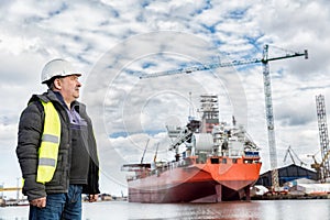 Shipbuilding engineer at the dockside in a port.