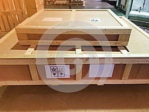 Shipment cartons box on pallets and wooden case on forklift in interior warehouse cargo for export and sorting goods in freight
