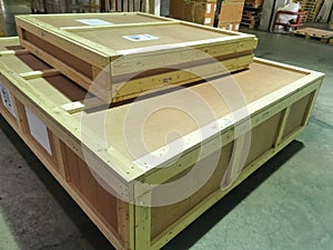 Shipment cartons box on pallets and wooden case on hand lift in interior warehouse cargo for export and sorting goods in freight l