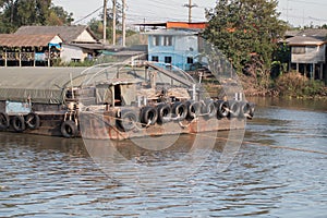 Shipping boat Transport raw materials in river.