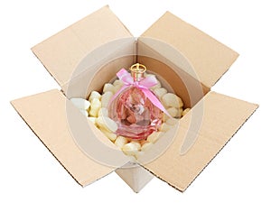 Shipping box with pink perfume bottle