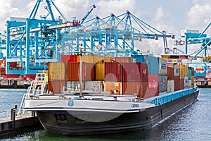 Shipping container barge at the Maasvlakte 2 harbor in the Port of Rotterdam. September 8, 2019