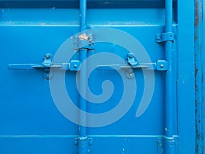 Shipping container door lock handle