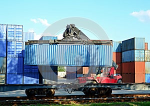 Shipping container loading by richtracker at International ship logistic terminal. Cargo sea containers in warehouse port.