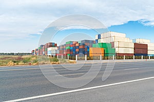 Shipping container stack yard and road background