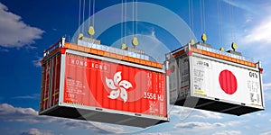 Shipping containers with flags of Hong Kong and Japan