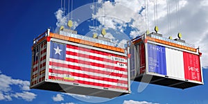 Shipping containers with flags of Liberia and France