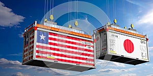 Shipping containers with flags of Liberia and Japan