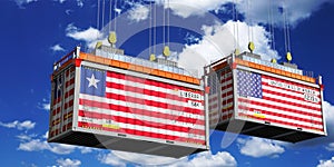 Shipping containers with flags of Liberia and USA