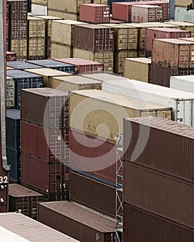 Shipping Containers Stacked At Busy Cargo Port