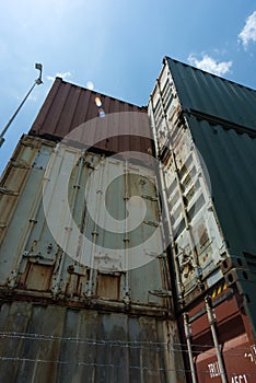 Shipping containers stacked disused