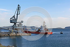 Shipping dock and a cargo vessel