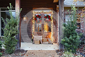 Shipping packages on porch during holiday season photo