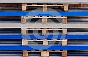 Shipping pallets stacked on shelves