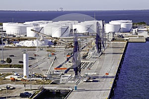 Shipping Port Fuel Tank Farm and Loading Cranes