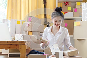 Shipping shopping online.  Woman freelance business small SME receive order from customer