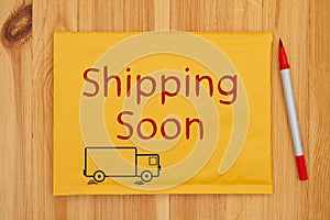 Shipping Soon message on yellow bubble mailing envelope