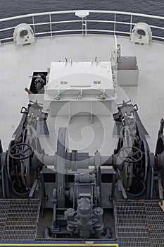 The Ships Anchor Chain and winch equipment on the Bow of a Vessel at sea