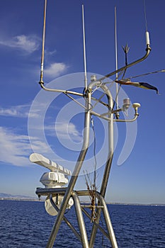 Ships antenna and navigation system in a clear blue sky