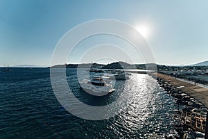 Ships on blue water sea ocean of the harbour in bodrum. Watch from the castle wide angle evening sun. Warm hot summer