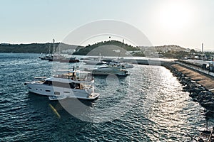 Ships on blue water sea ocean of the harbour in bodrum. Watch from the castle wide angle evening sun. Warm hot summer