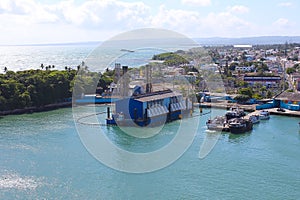 Ships, boats, containers, Puerto Plata harbor, port and cityscape of the industrial zone, Dominican Republic