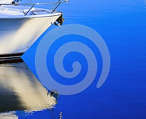 Ships bow and reflection, white & blue