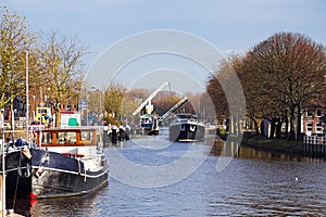 Ships in canal with lifting bridge