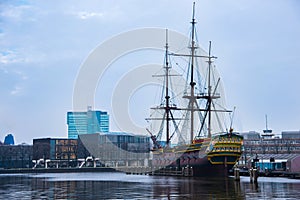 Ships on the canals in Amsterdam. City landscape. Winter season