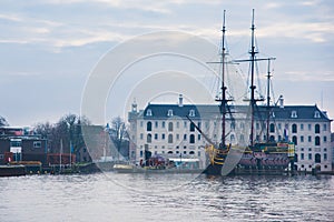 Ships on the canals in Amsterdam. City landscape. Winter season