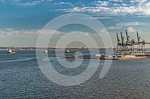 Ships and cranes at container terminal in port of Montevideo, Uruguay photo
