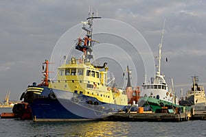 Ships in dock on the sunset