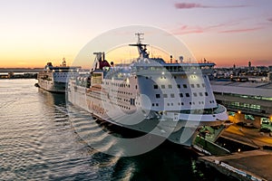 Ships and ferries in the port of La Gullet in Tunisia at sunset