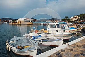 Ships and fishing boats in the harbor of Elounda, Crete