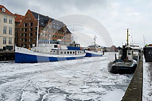 Ships on a frozen canal. Denmark. Copenhagen.