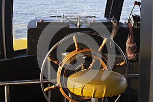 Ships helm of the ship in the captain's cabin, a tourist ship in Hurghada, Egypt